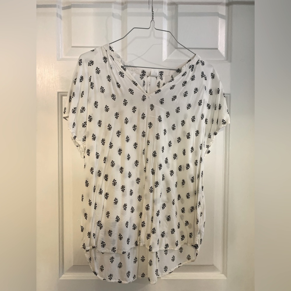 White blouse with black design